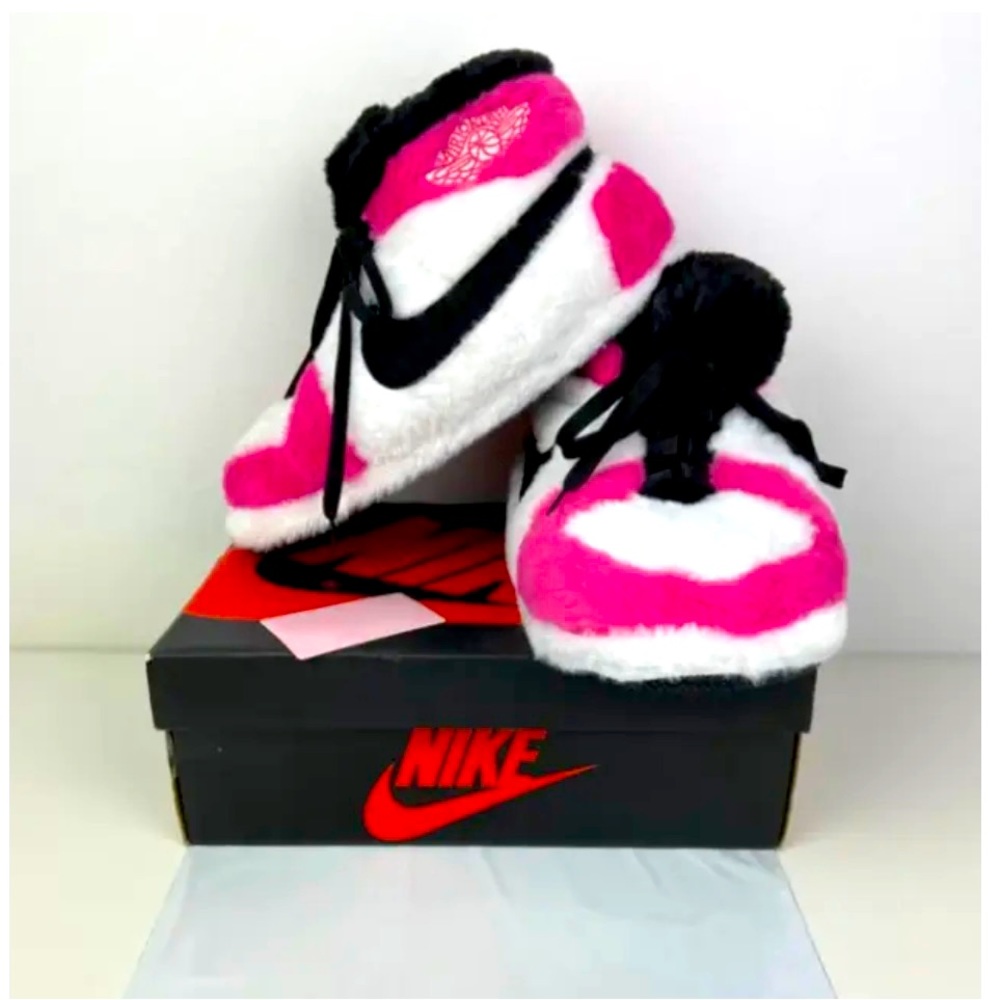 Jordan fuzzy slippers, fits any size!  These are super trendy and hard to find.